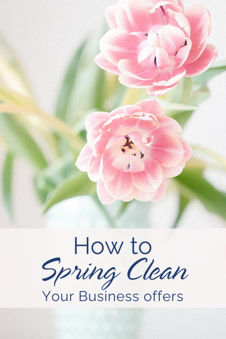 Pink flowers in teal vase with the words "how to spring clean your business offers" overlayed