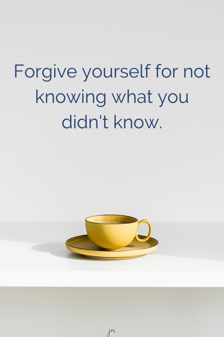 yellow coffee cup and saucer on a white table with the words "Forgive yourself for not knowing what you didn't know"