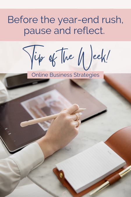 before the year-end rush, pause and reflect, Tip of the week! Written over a photo of a woman working at her desk, close up of her hand 