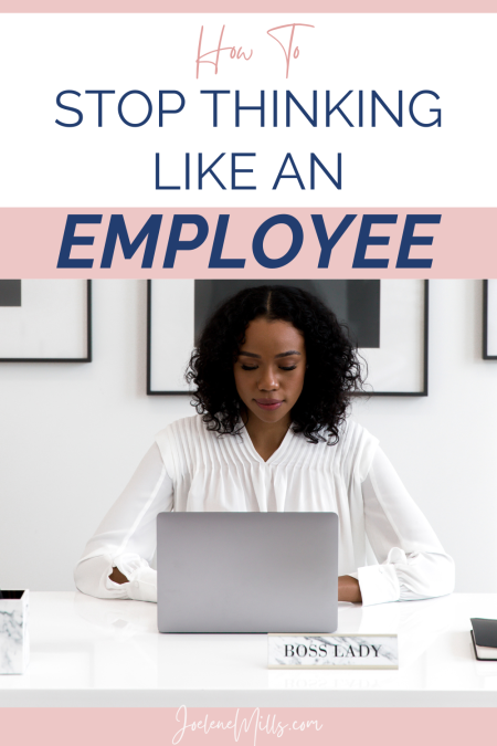 Woman working at her desk with the words stop thinking like an employee