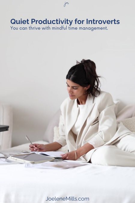 Woman working with the words quiet productivity for introvers overlayed above her.