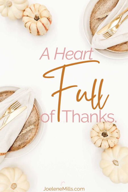 Setting a fall tablescape with pumpkins and the words "A heart full of thanks" overlayed