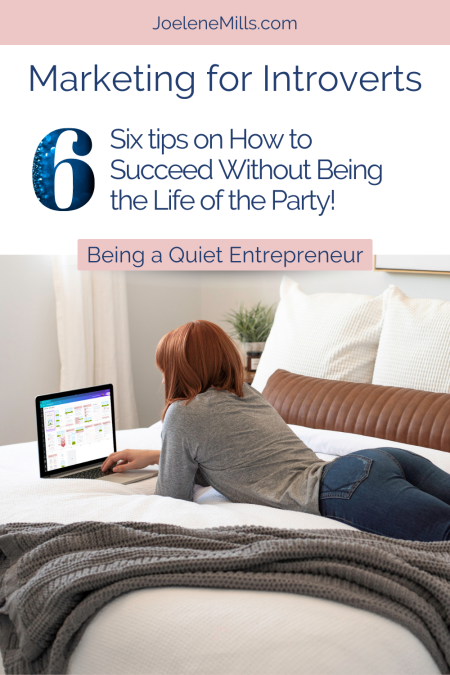 Woman working on her laptop comfortably on her bed with the words marketing for introverts 6 tips on how to succeed without being the life of the party
