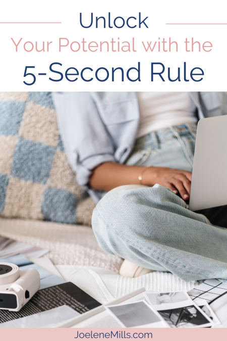 woman working on her laptop with papers and a camera scattered around and the words unlock your potential with the 5-second rule